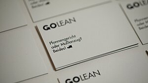 Corporate Design GOLEAN - Visitenkarten Weiß mit schwarzem Kantenschnitt